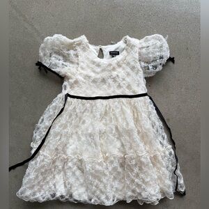 KIDS' RUFFLE PUFF SLEEVE MESH DRESS IN IVORY/ BLACK by Zumiez size 5.
